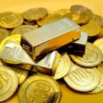 com-mercado-inseguro-e-fed-sob-ataque,-ouro-e-prata-batem-novo-recorde